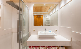 Luxueus appartement te koop met panoramisch zeezicht in een gated urbanisatie op de Golden Mile, Marbella 61733 