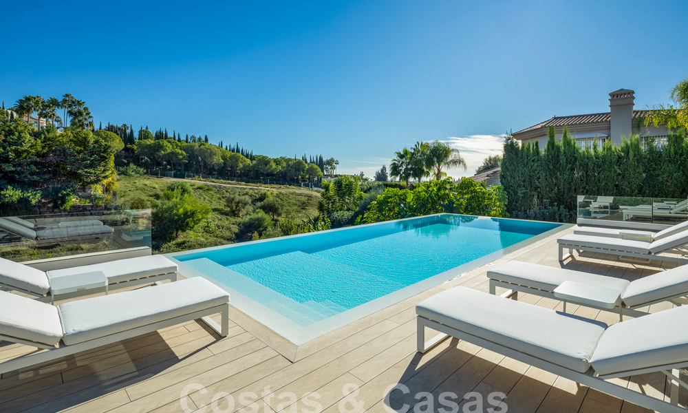 Geavanceerde luxevilla met modern design te koop op loopafstand van de golfbaan in Nueva Andalucia, Marbella 61348