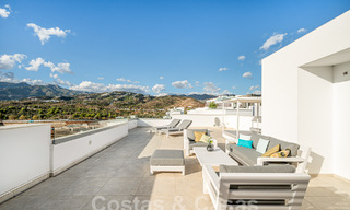 Instapklaar! Modern, luxueus penthouse te koop direct aan de golfbaan, met zee- en golfzicht, Oost-Marbella 62258 