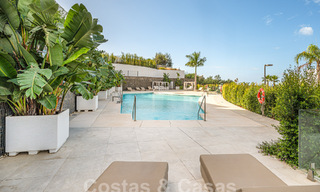 Instapklaar! Modern, luxueus penthouse te koop direct aan de golfbaan, met zee- en golfzicht, Oost-Marbella 62313 