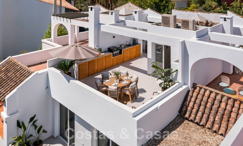 Stijlvol gerenoveerde rijwoning te koop, grenzend aan de golfbaan van La Quinta te Benahavis - Marbella 62821