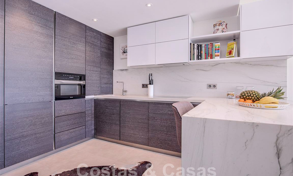 Modern appartement met ruim terras te koop met zeezicht en nabij golfbanen in een gated community in La Quinta, Marbella - Benahavis 62955