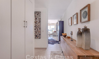 Modern appartement met ruim terras te koop met zeezicht en nabij golfbanen in een gated community in La Quinta, Marbella - Benahavis 62956 