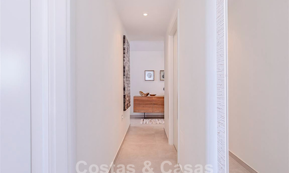 Modern appartement met ruim terras te koop met zeezicht en nabij golfbanen in een gated community in La Quinta, Marbella - Benahavis 62959