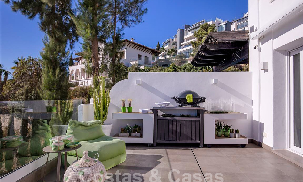 Modern appartement met ruim terras te koop met zeezicht en nabij golfbanen in een gated community in La Quinta, Marbella - Benahavis 62967
