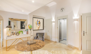 Ruim, luxe penthouse te koop met 4 slaapkamers in een eerstelijns golfcomplex in Nueva Andalucia, Marbella 63043 
