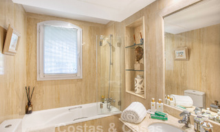 Ruim, luxe penthouse te koop met 4 slaapkamers in een eerstelijns golfcomplex in Nueva Andalucia, Marbella 63066 