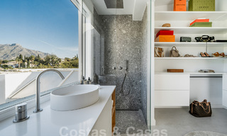 Luxueus duplex penthouse met hedendaags interieur te koop, eerstelijns golf in Nueva Andalucia’s golfvallei, Marbella 63312 