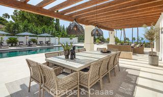 Royale luxe villa te koop met zeezicht en 5-sterrenvoorzieningen op de Golden Mile van Marbella 63648 