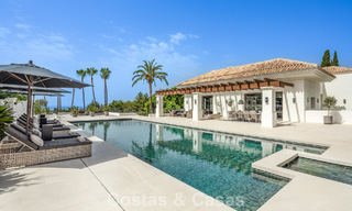 Royale luxe villa te koop met zeezicht en 5-sterrenvoorzieningen op de Golden Mile van Marbella 63651 
