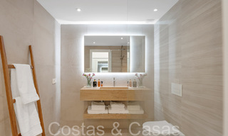 Verfijnd luxe appartement met meer-, berg- en zeezicht te koop in Nueva Andalucia, Marbella 64469 