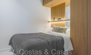 Luxueus appartement te koop met uitnodigend terras, privézwembad en zeezicht in Nueva Andalucia, Marbella 65195 