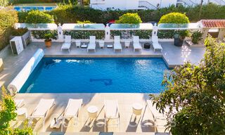 Ruime, hedendaagse luxevilla te koop in een populaire woonomgeving in Nueva Andalucia, Marbella 65004 
