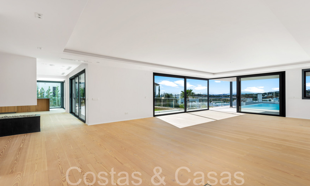 Nieuwe villa met moderne bouwstijl te koop in Nueva Andalucia’s golfvallei, Marbella 65889