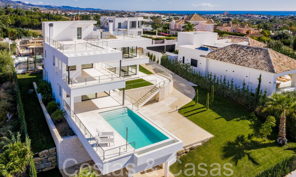 Nieuwe villa met moderne bouwstijl te koop in Nueva Andalucia’s golfvallei, Marbella 65933