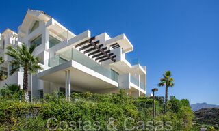 Instapklaar, gloednieuw penthouse met 3 slaapkamers te koop met zeezicht in een gated resort in Benahavis - Marbella 66233 