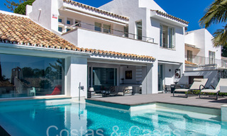 Tijdloze Andalusische luxevilla te koop in een afgesloten wijk bij Aloha Golf in Nueva Andalucia, Marbella 66566 