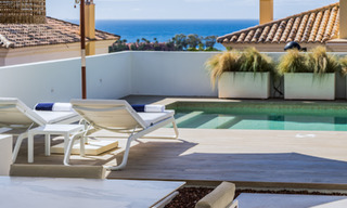Spaanse, halfvrijstaande luxevilla met zeezicht te koop in de afgeschermde golfgemeenschap van Santa Clara in Oost Marbella 67052 