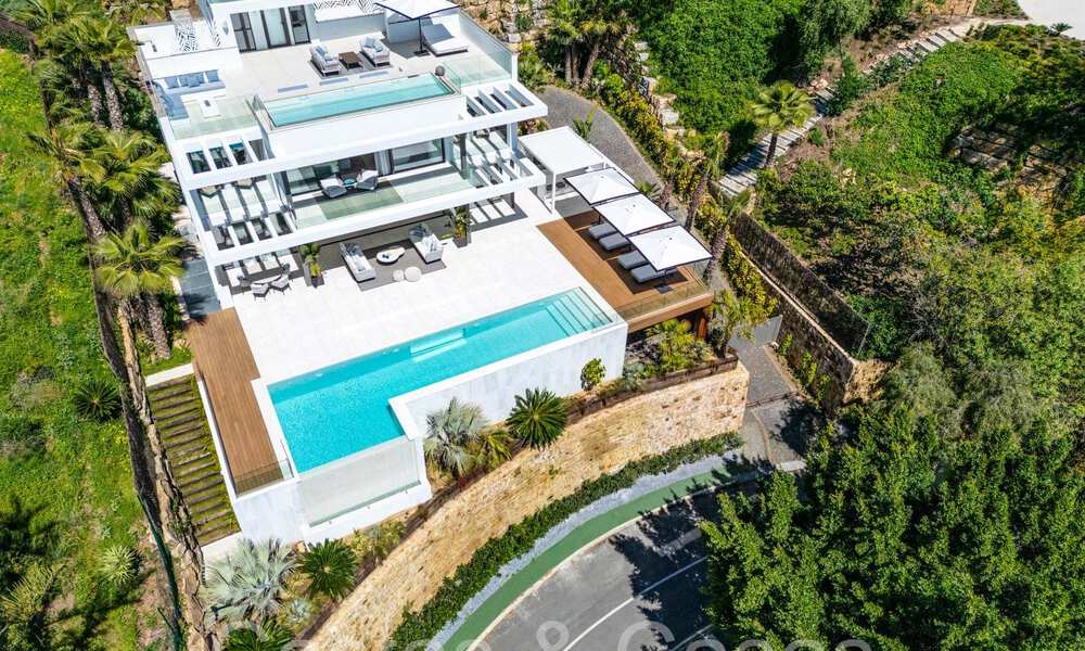 Instapklare, moderne luxevilla met onbelemmerd zeezicht te koop, gelegen in La Quinta, Marbella - Benahavis 67780