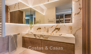 Verfijnd gerenoveerd appartement te koop in Las Dunas Park, een exclusief strandresort tussen Marbella en Estepona 774409 