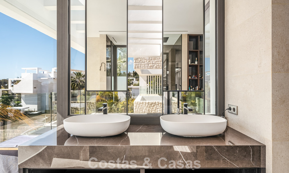 Ruime, modernistische luxevilla te koop met uitzicht op de golfbaan in Benahavis - Marbella 792516