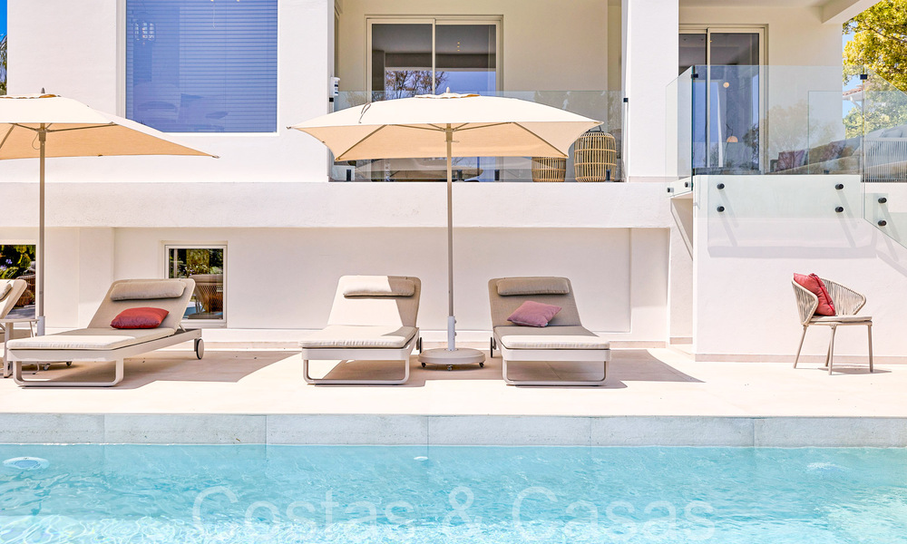 Prachtige gerenoveerde villa in eigentijdse mediterrane stijl te koop, grenzend aan de golfbaan in Benahavis - Marbella 69221