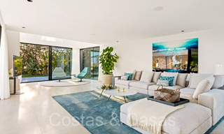 Superieure luxevilla te koop, frontlijn golf met panoramisch berg-, golf en zeezicht in Benahavis - Marbella 69296 