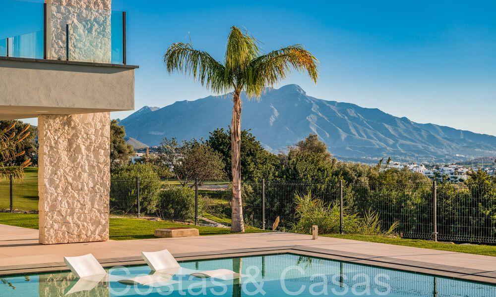 Superieure luxevilla te koop, frontlijn golf met panoramisch berg-, golf en zeezicht in Benahavis - Marbella 69301