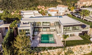 Superieure luxevilla te koop, frontlijn golf met panoramisch berg-, golf en zeezicht in Benahavis - Marbella 69306 