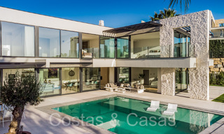 Superieure luxevilla te koop, frontlijn golf met panoramisch berg-, golf en zeezicht in Benahavis - Marbella 69307 