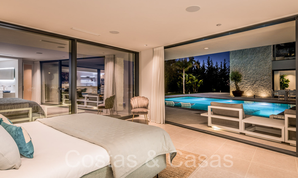 Superieure luxevilla te koop, frontlijn golf met panoramisch berg-, golf en zeezicht in Benahavis - Marbella 69309