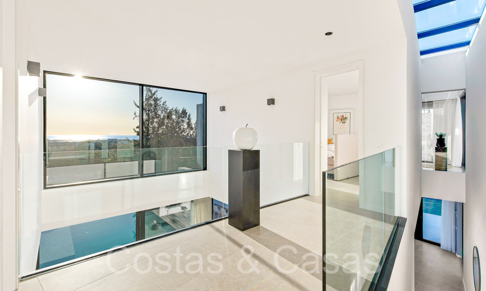 Superieure luxevilla te koop, frontlijn golf met panoramisch berg-, golf en zeezicht in Benahavis - Marbella 69312