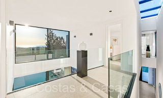 Superieure luxevilla te koop, frontlijn golf met panoramisch berg-, golf en zeezicht in Benahavis - Marbella 69312 