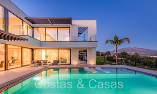 Superieure luxevilla te koop, frontlijn golf met panoramisch berg-, golf en zeezicht in Benahavis - Marbella 69314 
