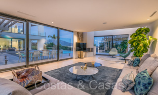Superieure luxevilla te koop, frontlijn golf met panoramisch berg-, golf en zeezicht in Benahavis - Marbella 69319 