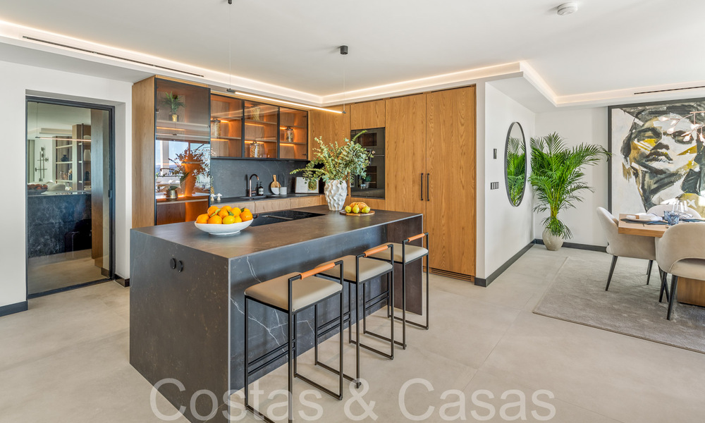 Eersteklas duplex penthouse met panoramisch zeezicht en eigen dompelbad te koop in Nueva Andalucia, Marbella 69466