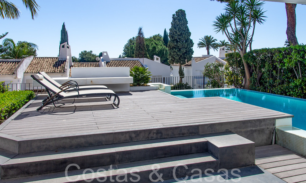 Huizen te koop in een beveiligde urbanisatie, omgeven door de Aloha golfbaan in Nueva Andalucia, Marbella 805063