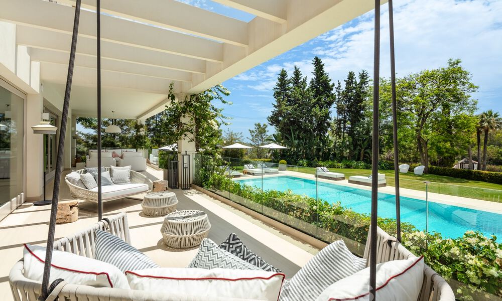 Huizen te koop in een beveiligde urbanisatie, omgeven door de Aloha golfbaan in Nueva Andalucia, Marbella 805080