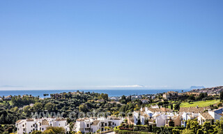 Moderne luxe appartementen te koop met zeezicht in een beveiligde urbanisatie in het vooraanstaande Benahavis - Marbella 805288 