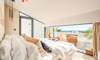 Luxueus gerenoveerd townhouse met zeezicht te koop, in een afgeschermde woonwijk op Marbella’s Golden Mile 774997 