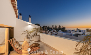 Luxueus gerenoveerd townhouse met zeezicht te koop, in een afgeschermde woonwijk op Marbella’s Golden Mile 775002 