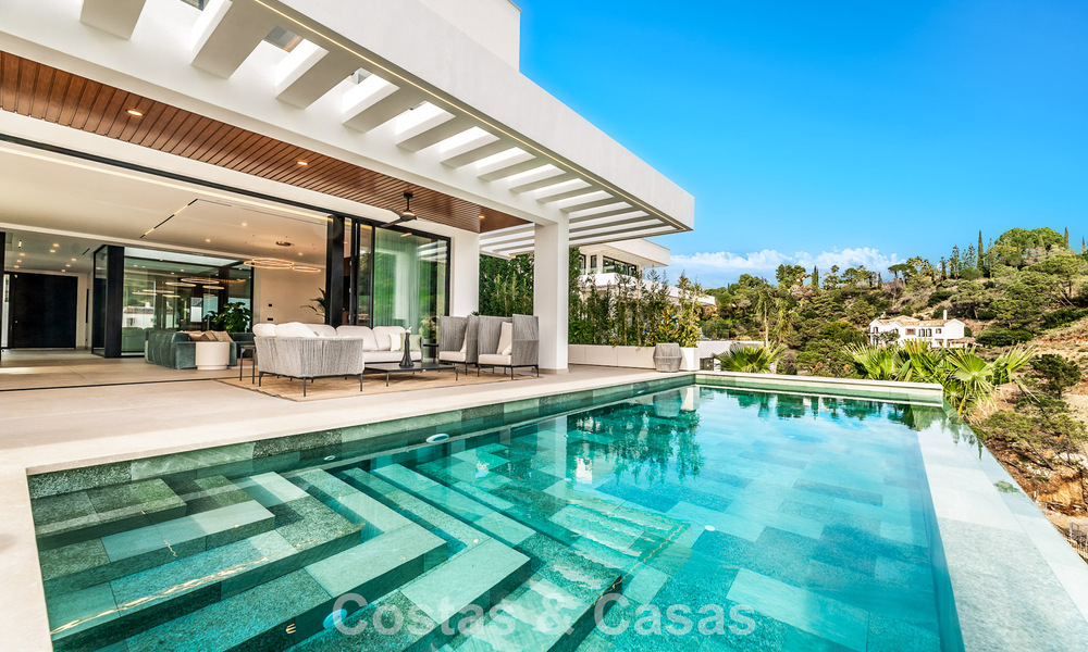 Gesofisticeerde designervilla met magnifiek zeezicht te koop in El Madroñal, Benahavis - Marbella 795625
