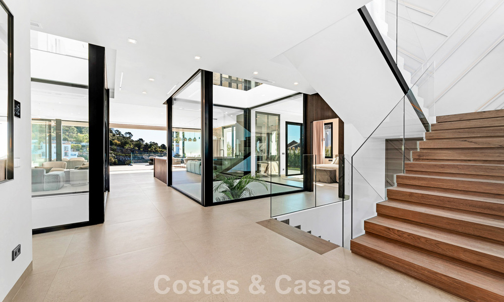 Gesofisticeerde designervilla met magnifiek zeezicht te koop in El Madroñal, Benahavis - Marbella 795637