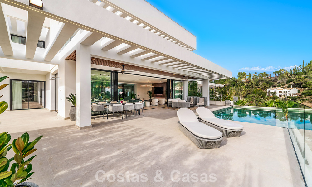 Gesofisticeerde designervilla met magnifiek zeezicht te koop in El Madroñal, Benahavis - Marbella 795645