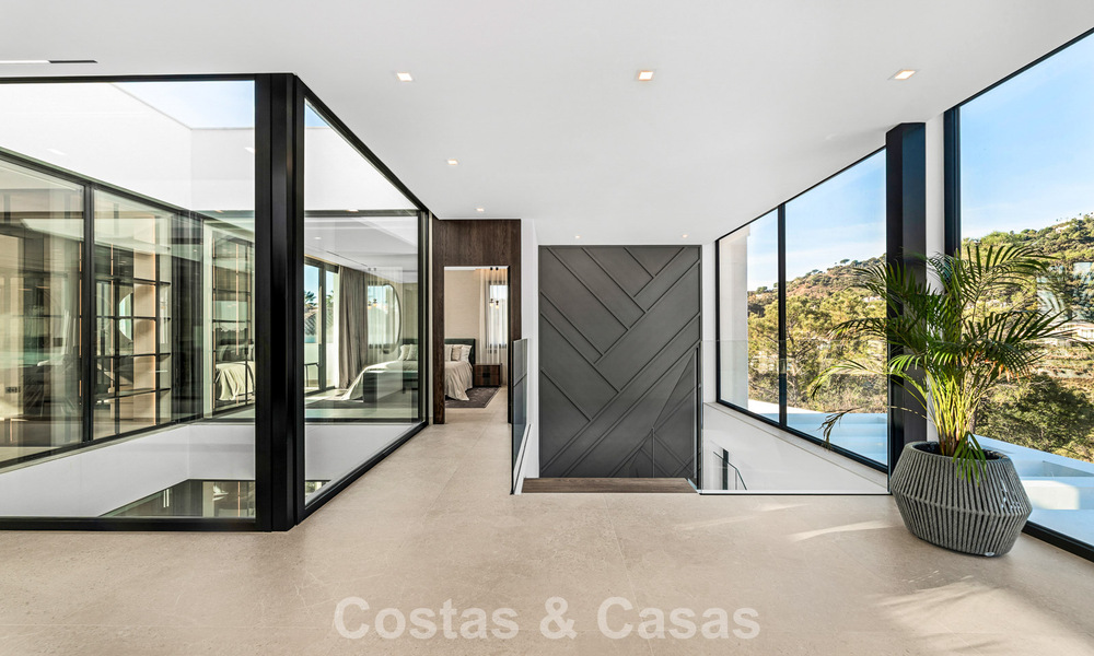 Gesofisticeerde designervilla met magnifiek zeezicht te koop in El Madroñal, Benahavis - Marbella 795647