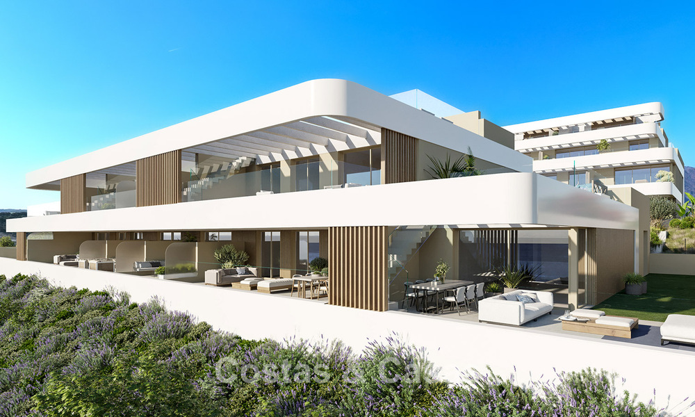 Moderne nieuwbouwappartementen te koop dicht bij het strand en met zeezicht in Estepona West 775321