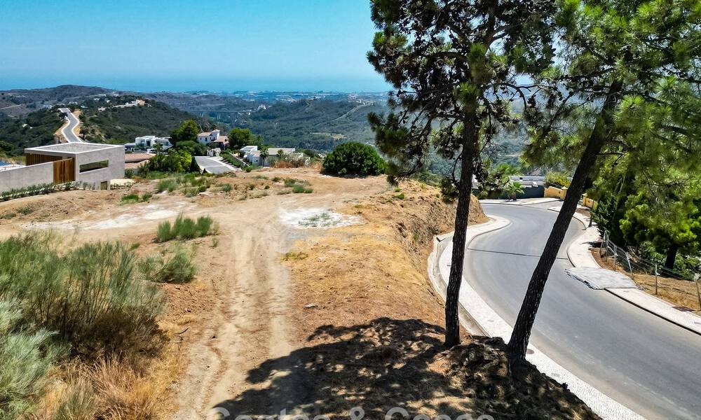 Bouwgrond met zeezicht te koop in een afgeschermde urbanisatie in de heuvels van Benahavis - Marbella 777821