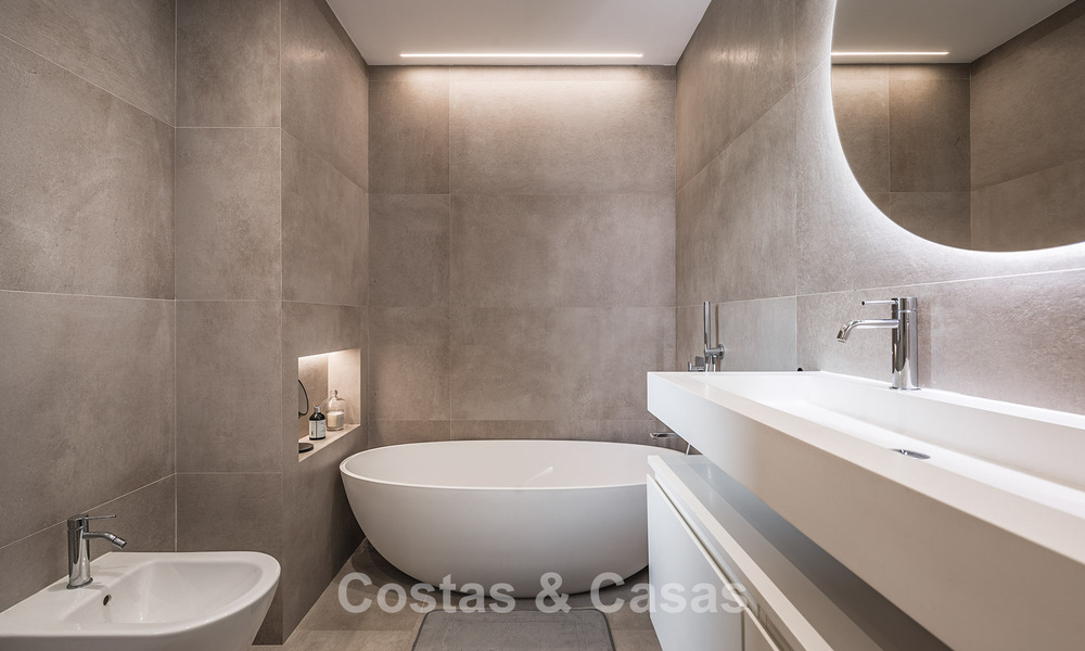 Volledig gerenoveerd 3-slaapkamer tuinappartement te koop in een luxueus complex in Marbella - Benahavis 778520