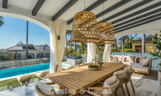 Verfijnde luxevilla in moderne mediterrane bouwstijl te koop met zeezicht in een gated complex op Marbella’s Golden Mile 778756 