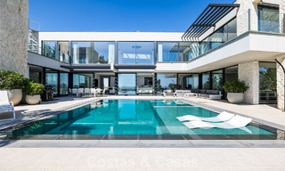 Instapklare, moderne villa te koop, grenzend aan de golfbaan in een begeerde villawijk van Marbella - Benahavis 778667 